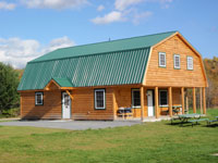Log Cabin Rental Photos - Downstairs Bedroom - North Country Rivers